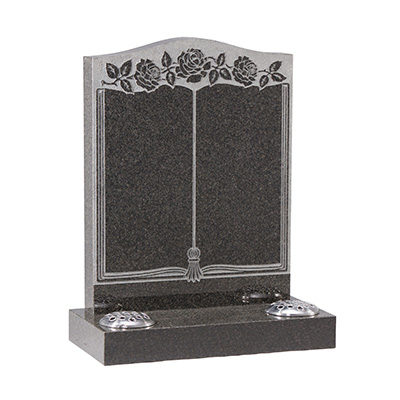 image of a dark grey granite headstone with book and flower detail for a product listing for a headstone