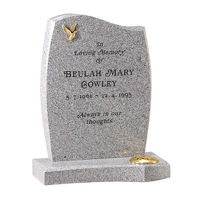 image of a warwick grey granite headstone with a bronze bird ornament for a product listing for a headstone