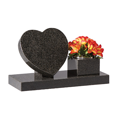 image of a black granite heart shaped memorial alongside a vase on a base for a product listing for a marker memorial