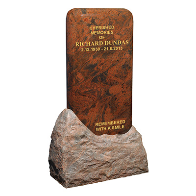 image of a twilight granite monolith memorial with polished top section and rustic lower section for a product listing for a monolith or boulder memorial