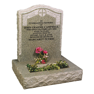 image of a karin grey granite small kerb memorial with rustic edges and a deeply carved gothic ornament for a product listing for a small kerb memorial