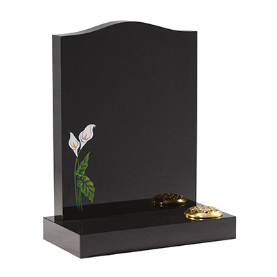 image of a black granite headstone with lily detailing for a product listing for a headstone