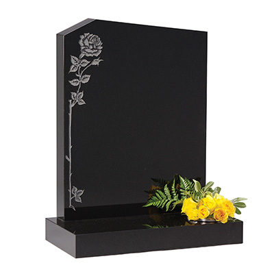 image of a black granite headstone with a climbing rose for a product listing for a headstone