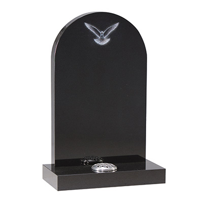 image of a black granite headstone with an etched dove ornament for a product listing for a headstone