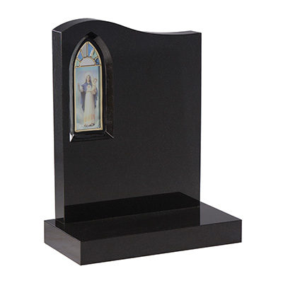 image of a black granite headstone with a stained glass window for a product listing for a headstone