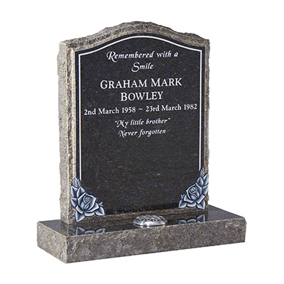 image of an ocean blue granite rustic hand carved memorial with craved roses and rustic margins for a product listing for a rustic and hand carved memorial