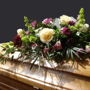 flowers on coffin